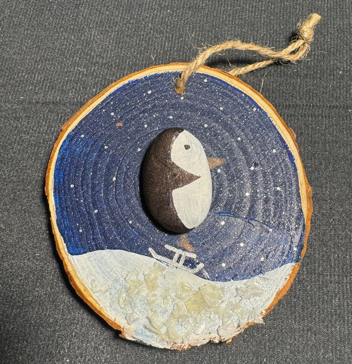 Penguin log art