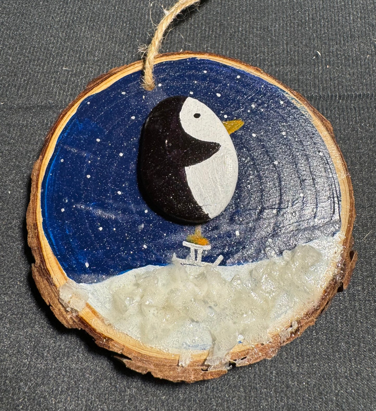 Penguin log art