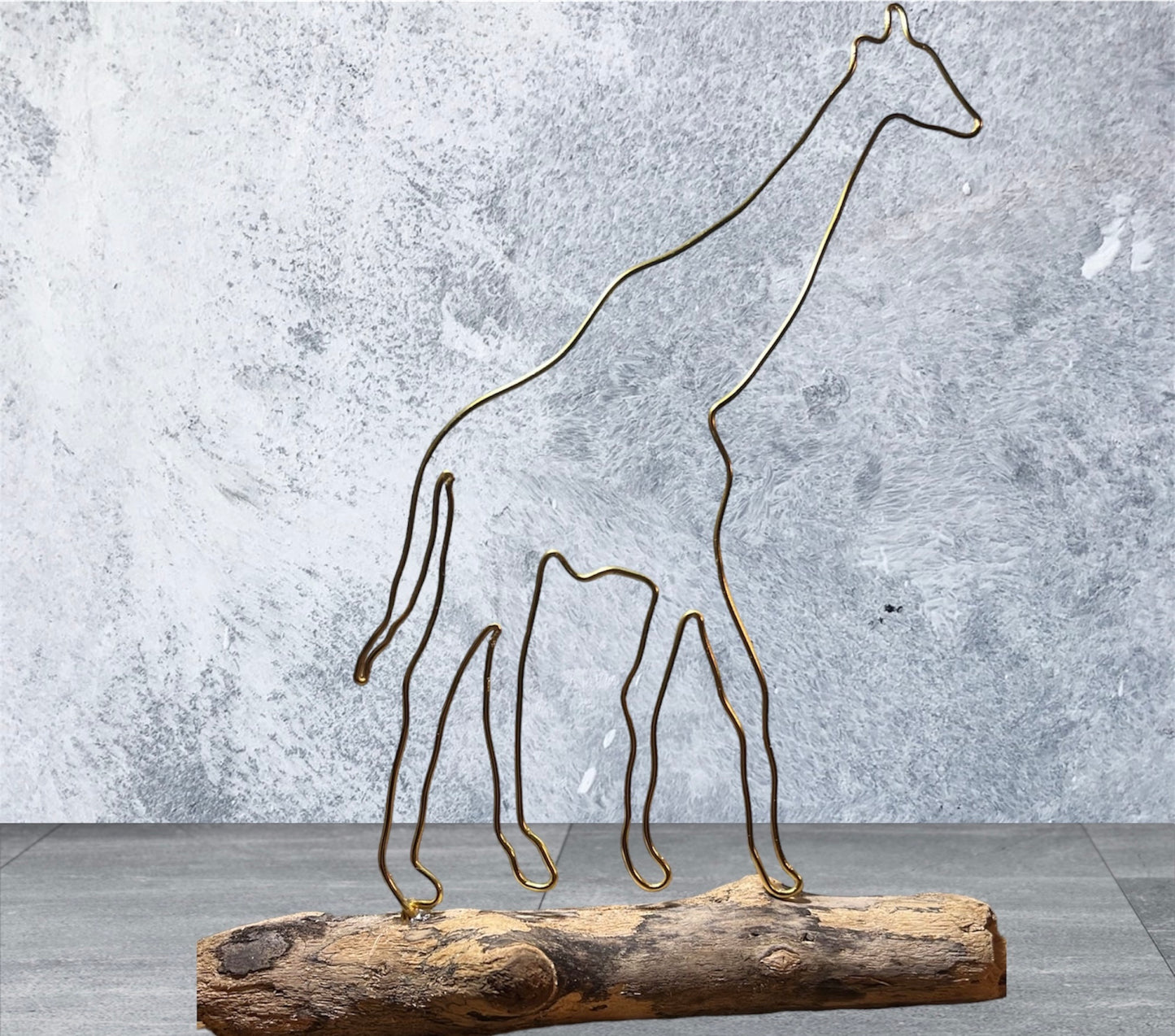 Giraffe wire silhouette on driftwood