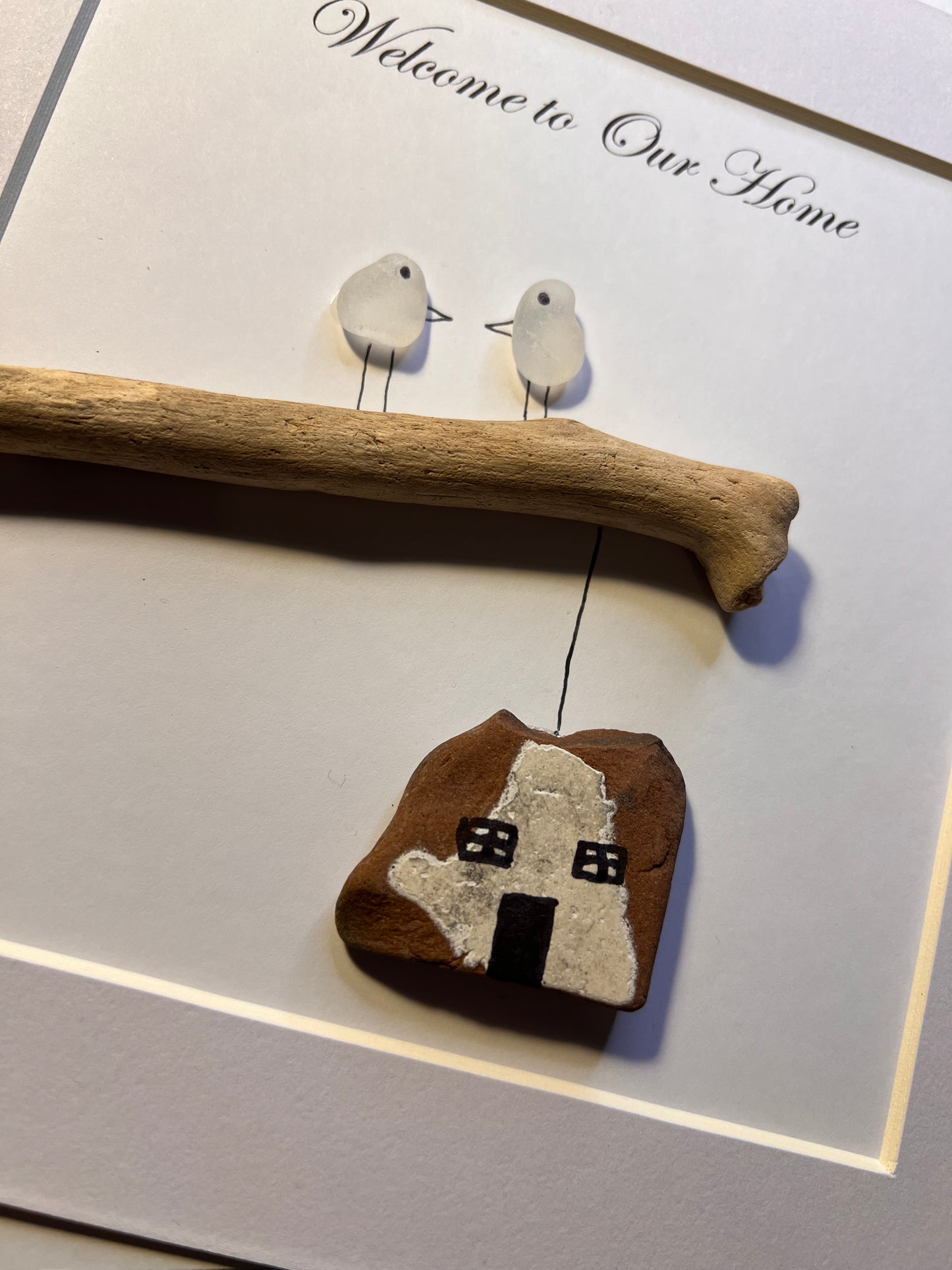 Sea glass and driftwood welcome home frame