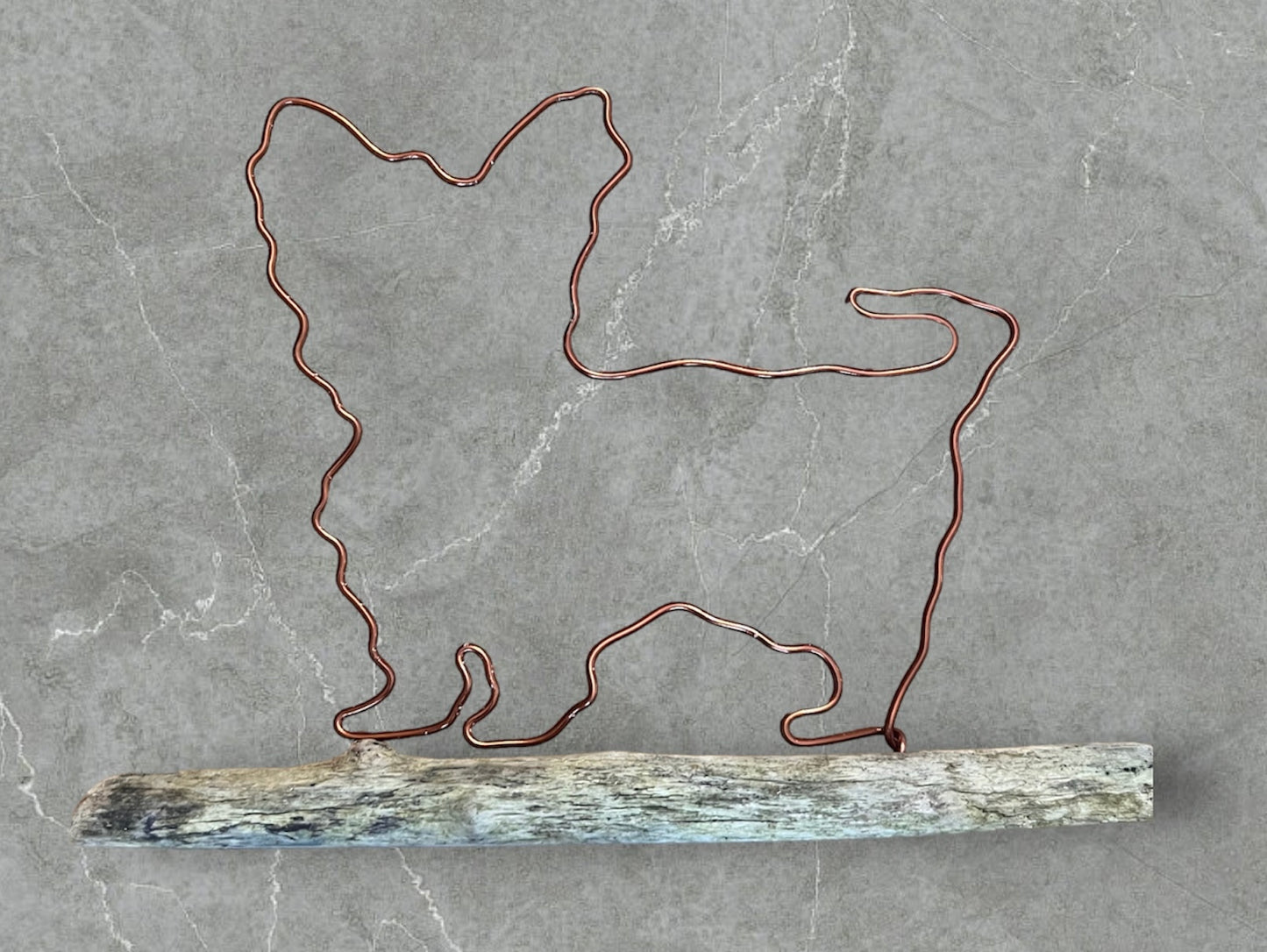 Yorkshire Terrier wire silhouette on driftwood