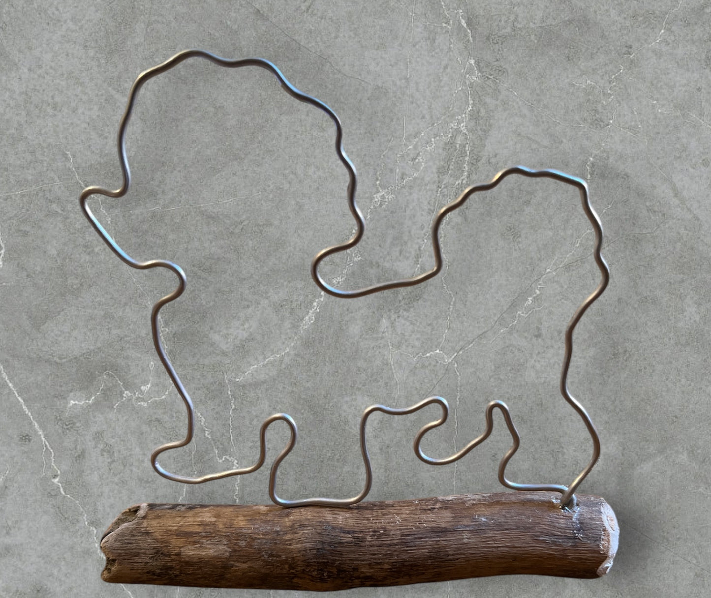 Bichon Frisé wire silhouette on driftwood
