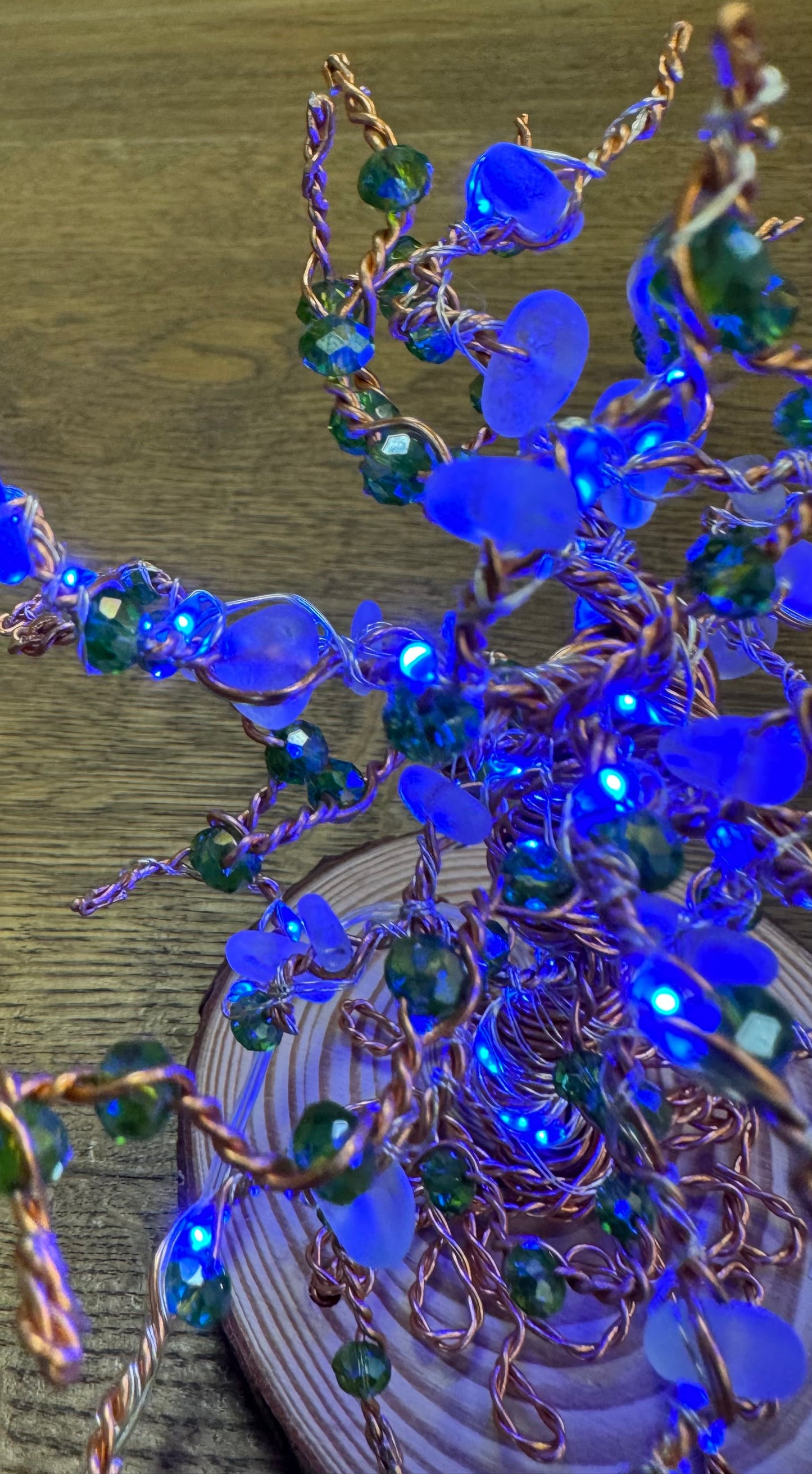 Wire and Sea glass tree. Bronze wire, White Sea glass, green crystal beads and blue LED lights