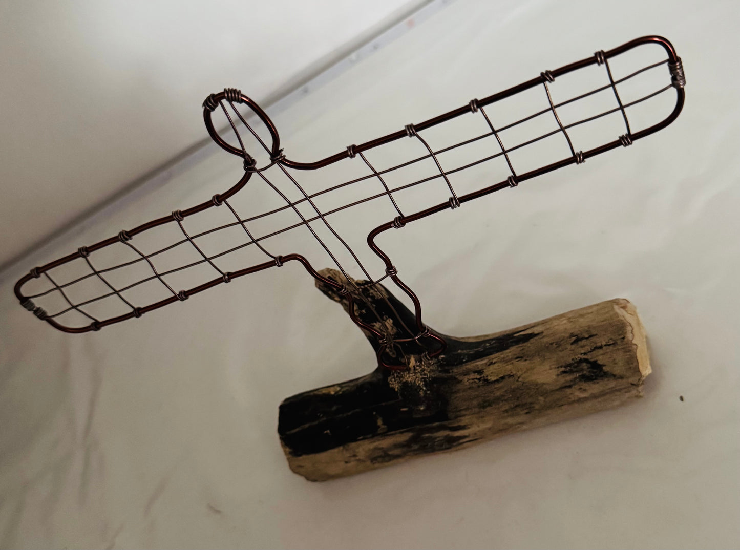 Angel Of The North wire silhouette on Driftwood