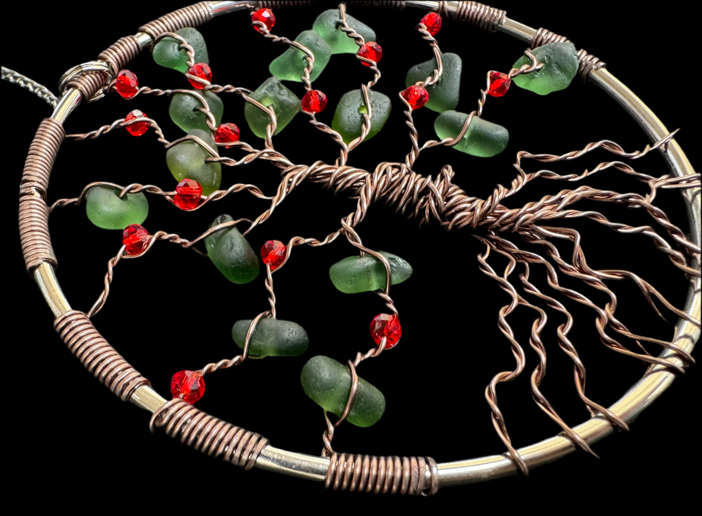 Sea glass tree of life suncatcher. Bronze wire with green sea glass and red crystal beads