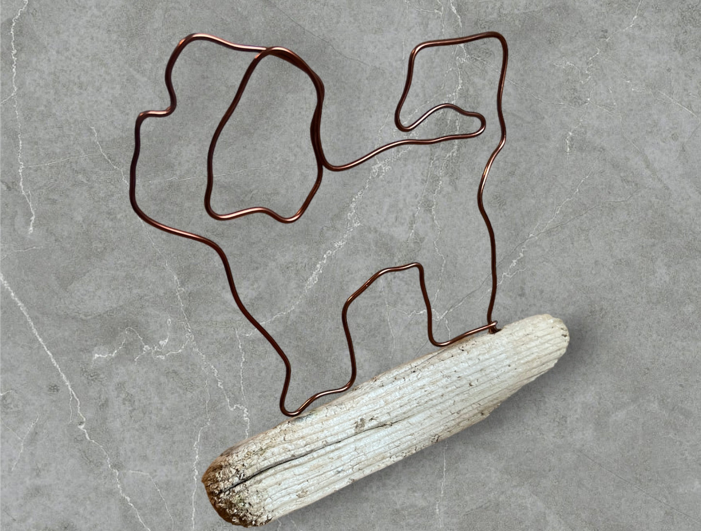Shih Tzu wire silhouette on driftwood