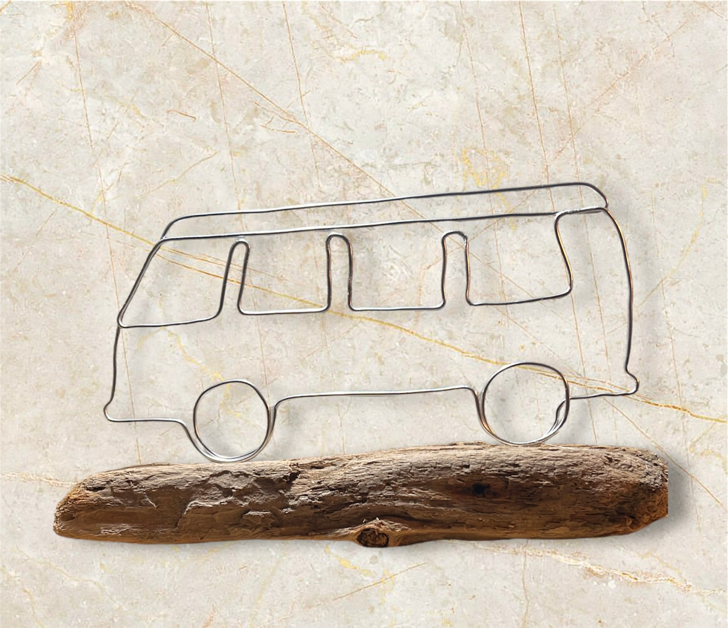 Campervan wire silhouette on driftwood