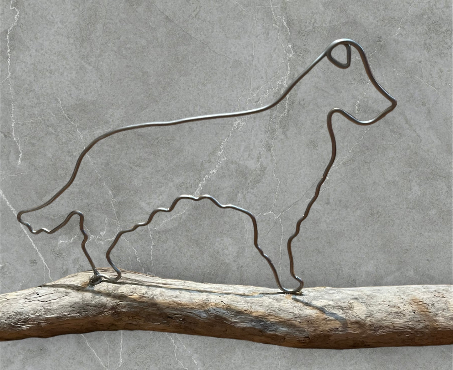 Border Collie wire silhouette on driftwood