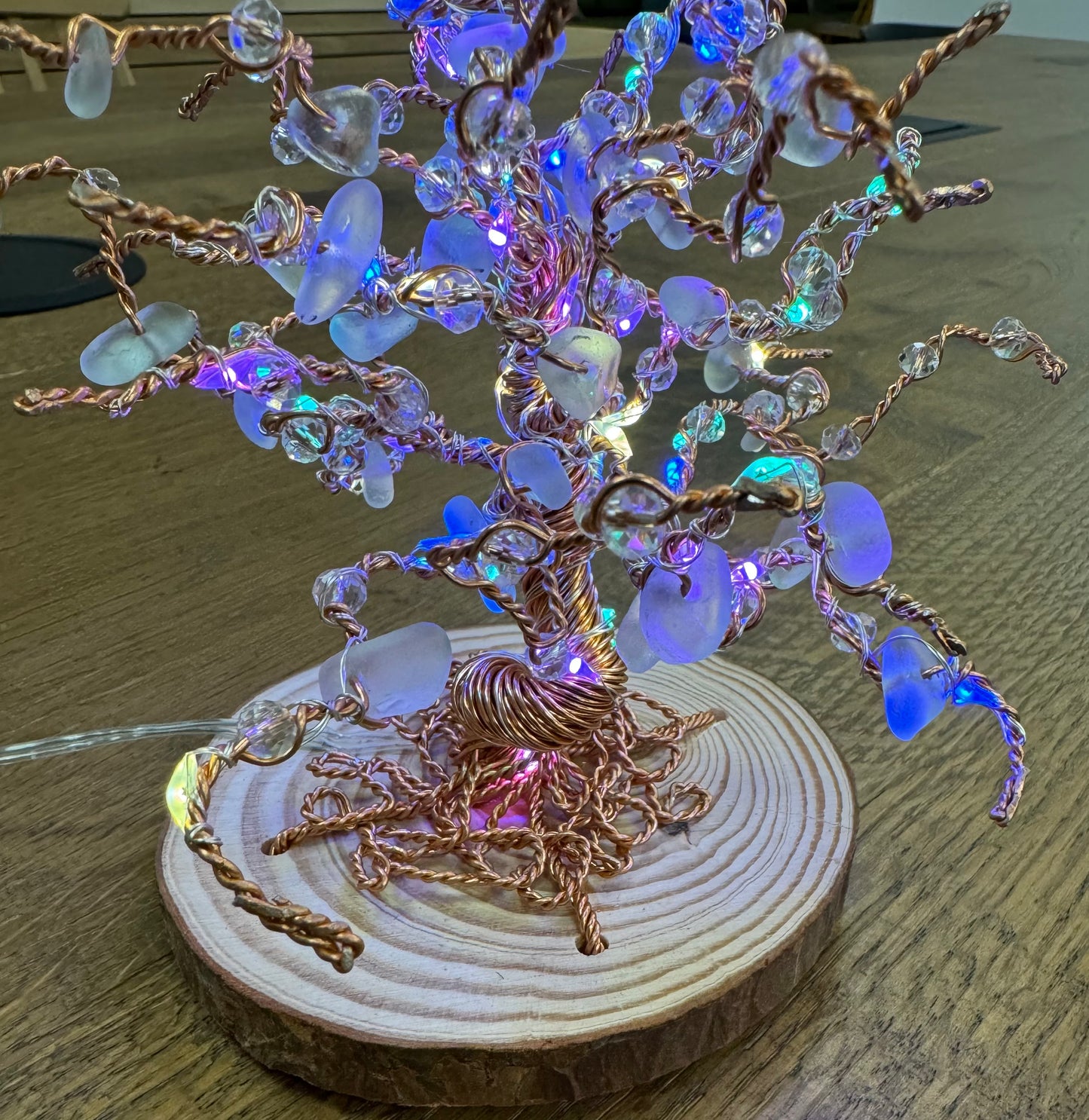 Wire and Sea glass light up tree. Bronze wire, white sea glass and multi coloured LED lights.
