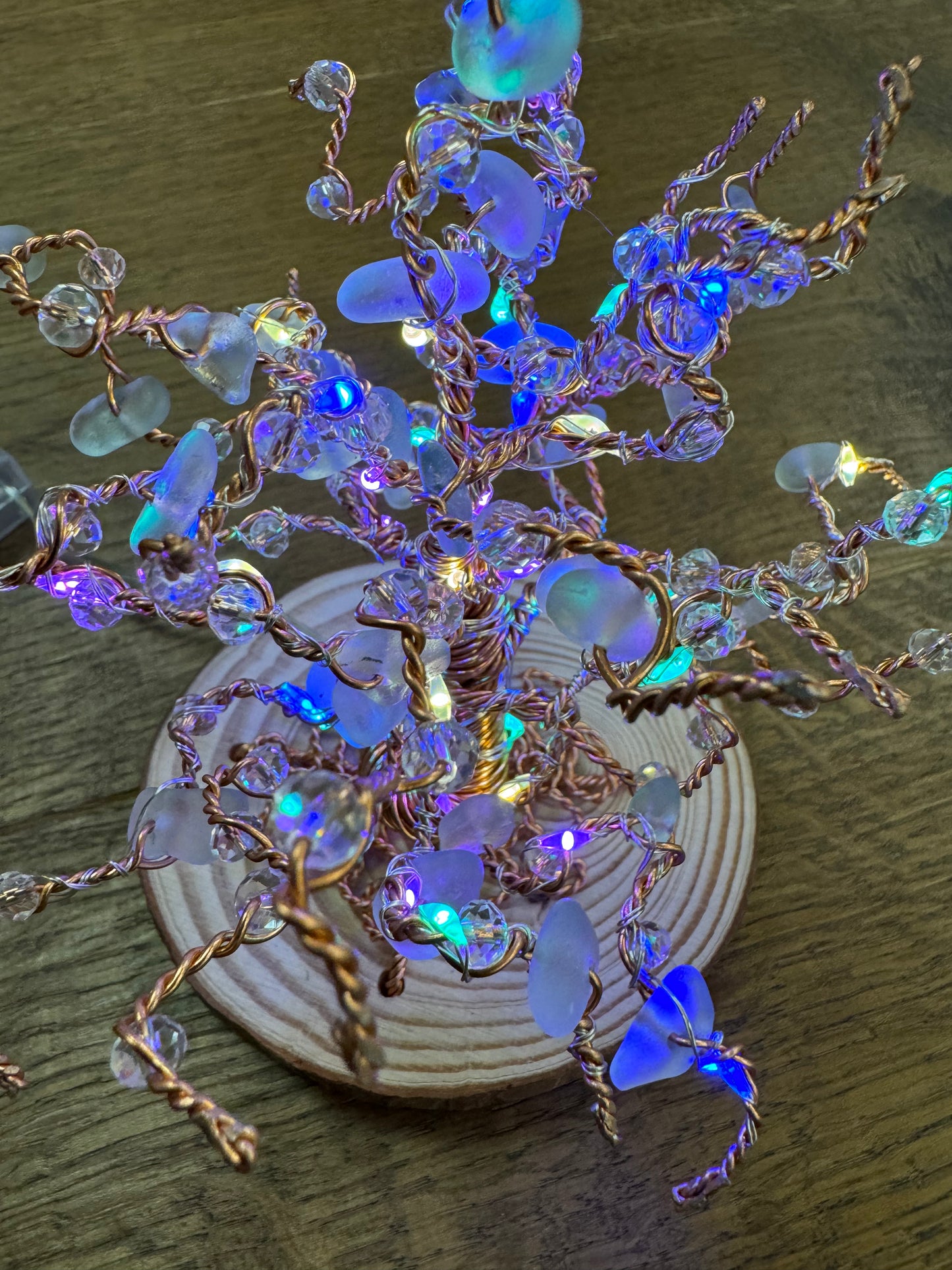 Wire and Sea glass light up tree. Bronze wire, white sea glass and multi coloured LED lights.