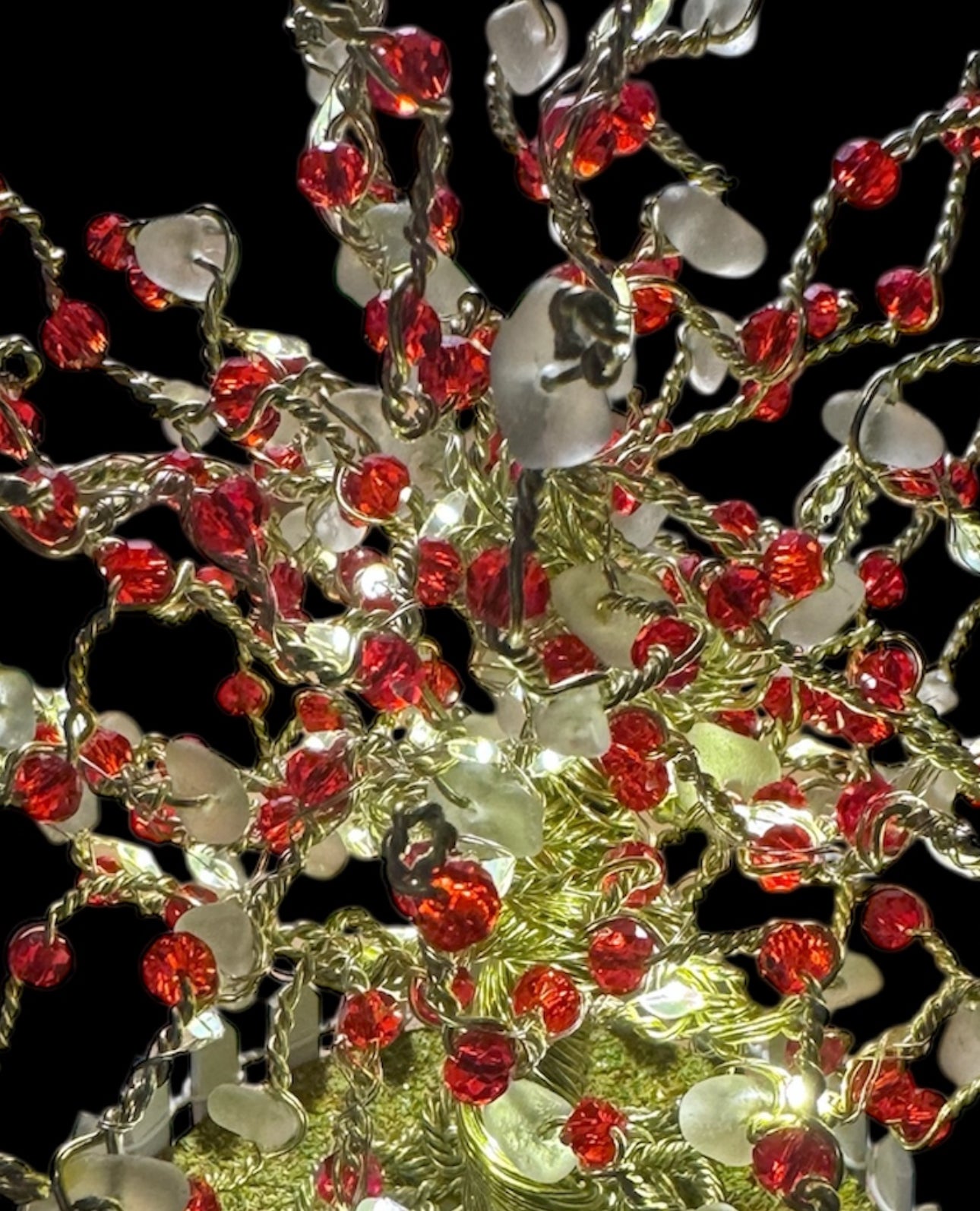 Sea glass tree with mini picket fence. Green wire with White Sea glass and red crystal beads and LED Lights