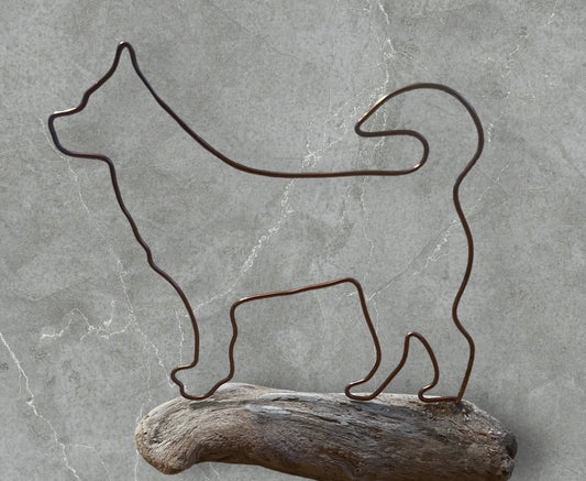 Japanese Akita wire silhouette on driftwood